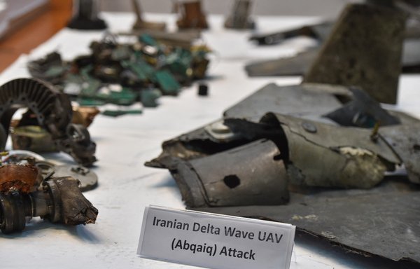 A picture taken on September 18, 2019, shows displayed fragments of what the Saudi defence ministry said were Iranian cruise missiles and drones recovered from the attack site that targeted Saudi Aramco's facilities. [Fayez Nureldine/AFP]