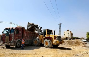 Impoverished Iranians bristle at $100 billion price tag for Syria 'investments'