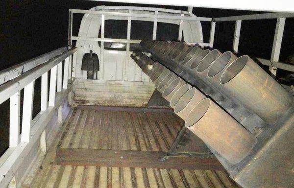 A pick-up truck carrying a rocket launcher was left behind by Iran-backed militants after they fired rockets at Camp Taji, north of Baghdad, on March 11, 2020. [Security Media Cell]