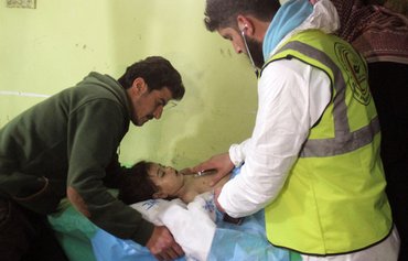 Chemical weapons watchdog votes to suspend Syria's rights