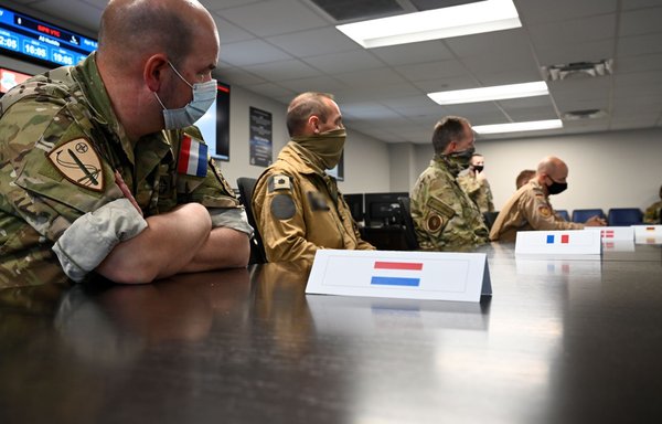 Coalition leaders from multiple countries gather for a conference at Shaw Air Force Base (AFB), South Carolina, April 9. Senior military representatives from nine countries traveled to Shaw AFB in early April to participate in 'Coalition Week', a series of events focused on showcasing US Air Forces Central's ability to distribute operations and command and control airpower from more than one location. [US Air Force]
