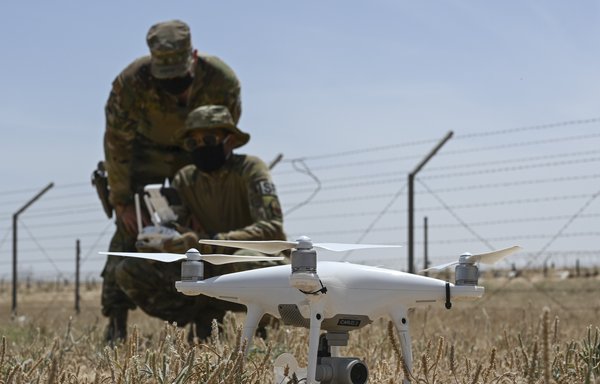 US Air Force airmen operate a counter-small unmanned aircraft system during the Air and Missile Defence Exercise (AMDEX) 21-02 at Ali al-Salem Air Base, Kuwait, April 21. About 1,700 US military personnel took part in this year's AMDEX at Shaw Air Force Base, South Carolina, and multiple deployed locations April 12-23. [US Air Force]