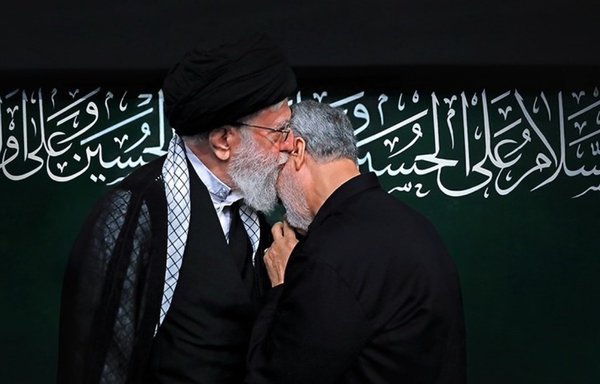 Iranian leader Ali Khamenei embraces IRGC-QF commander Qassem Soleimani in this file photo from 2019. [Tasnim News via Khamenei.ir]