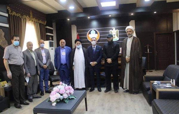 A delegation from the Iran-affiliated Badr Organisation visits the University of Mosul on August 11. [Yerdili Facebook page]