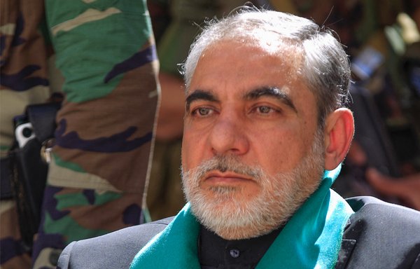 Iranian ambassador to Yemen Hassan Eyrlou attends a vigil in Sanaa on January 2 to mark the first anniversary of the killing of IRGC Quds Force commander Qassem Soleimani. [Mohammed Huwais/AFP]