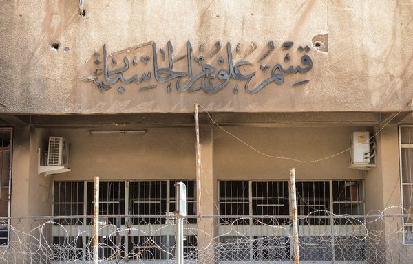A picture taken June 13, 2017, months after ISIS was driven out, shows the science department of the University of Mosul. A UN team is investigating the group's alleged use of the university to develop chemical weapons. [Mohamed el-Shahed/AFP]