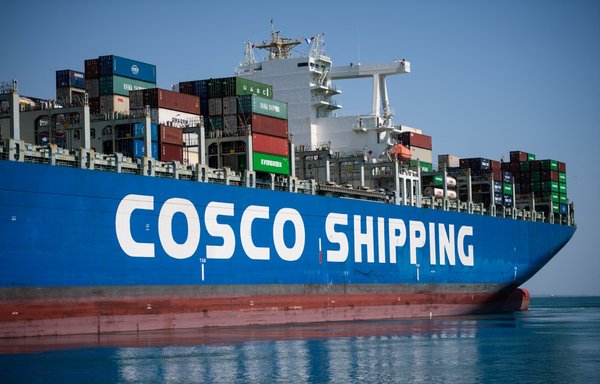 The United States sanctioned two units of China's largest transportation network, COSCO, in September 2019, stating that they had been complicit in circumventing sanctions on Iran. [Clement Mahoudeau/AFP]