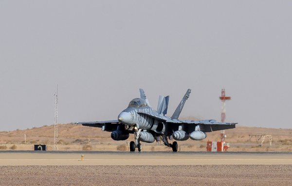 A US Marine Corps F/A-18D Hornet lands on the flightline at Prince Sultan Air Base, Saudi Arabia, May 8. [US Air Force]