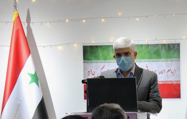 The head of the Iranian Trade Centre in Damascus, Asghar Mirzai, gives a presentation in Damascus in this undated photo. [SANA]