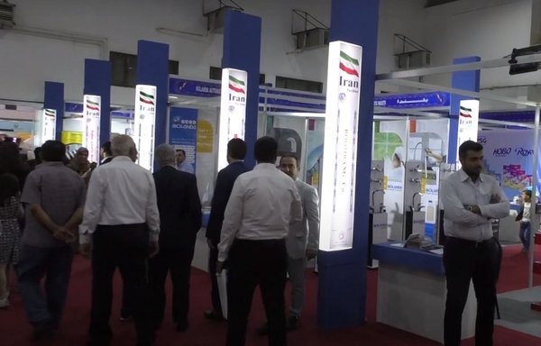 Syrians inspect the Iranian pavilion at the Damascus International Fair in this screenshot from a video posted online in August 2019. [SANA]