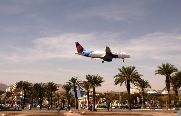 A picture taken on February 24, 2011, shows an Israir company plane landing at the airport in the centre of the Israeli Red Sea resort of Eilat. [Jack Guez/AFP]
