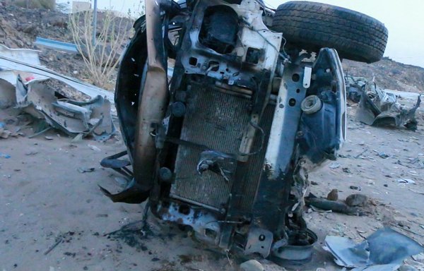 This picture taken June 5 shows a destroyed vehicle at the scene of a missile strike at a gas station in Yemen's city of Marib. Locals say that Yemeni soldiers from a nearby military base often go there with their families to refuel their cars. [AFP]