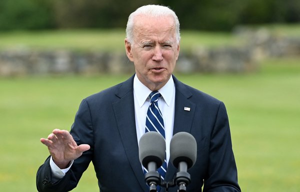 US President Joe Biden delivers a speech on the COVID-19 pandemic on June 10 in Britain. The United States announced a historic donation of half a billion COVID-19 vaccine doses for world's poorer countries. [Brendan Smialowski/AFP]