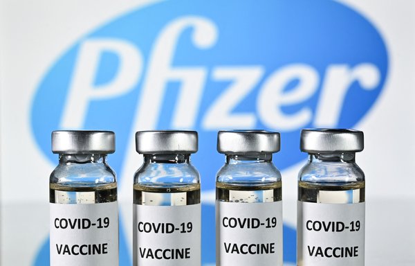 The United States will purchase 500 million Pfizer jabs to send across the world to battle the deadly COVID-19 pandemic. [Justin Tallis/AFP]