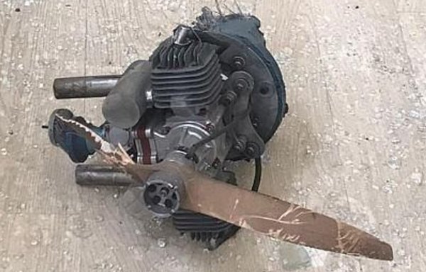 The remains of an explosive-laden drone fired into Saudi Arabia's Asir province from Yemen are seen on the floor of a school building following the June 13 attack. [Saudi Press Agency]