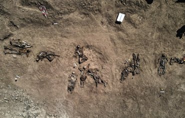 Iraq opens mass grave in Ninawa to identify ISIS victims