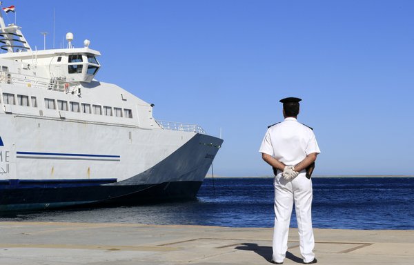 A policeman stands on the pier at the seaport of Egypt's southern Red Sea city of Hurghada last June 19 near the ferry connecting Hurghada to the resort city of Sharm el-Sheikh on the Sinai peninsula. [Khaled Desouki/AFP]