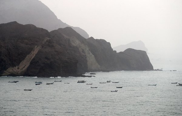 A picture taken August 10, 2018, shows Yemeni fishing boats along the Yemeni side of the strategic strait of Bab al-Mandab, which separates the Arabian Peninsula from east Africa. [Karim Sahib/AFP]