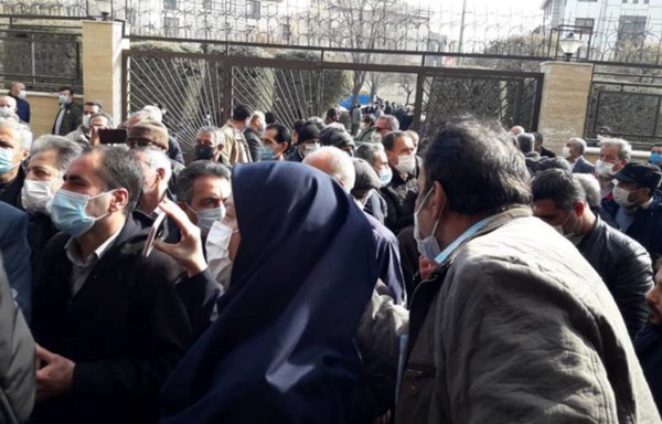 A group of retired government workers protest in Iran in March. [ILNA.ir]