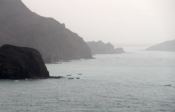 A picture taken on August 10, 2018, shows a view of Yemeni fishing boats along the Yemeni side of the strategic strait of Bab al-Mandab, which separates the Arabian Peninsula from east Africa. [Karim Sahib/AFP]