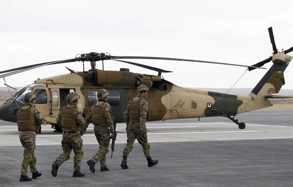 A picture taken January 28, 2018, shows an American Black Hawk helicopter during a handing-over ceremony at King Abdullah II Air Base in Zarqa. ​The United States delivered two Black Hawk helicopters to Jordan to help protect the kingdom's borders and counter the threat from extremists. [Stringer/AFP]