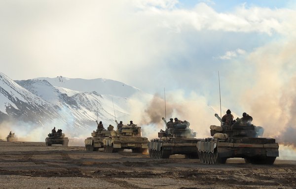 Chinese tanks are shown in formation in Xinjiang on June 7. [Chinese Ministry of Defence]