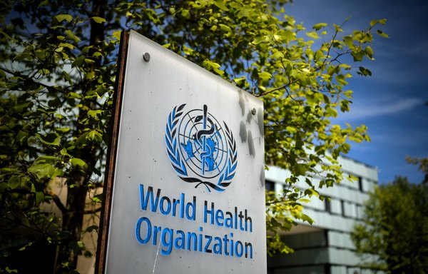 A picture taken on May 8 shows a sign of the World Health Organisation (WHO) at the entrance of its headquarters in Geneva amid the COVID-19 coronavirus outbreak. [Fabrice Coffrini/AFP]