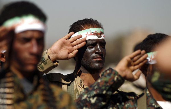 Newly recruited Houthi fighters take part in a gathering in Sanaa. [Mohammed Huwais/AFP]
