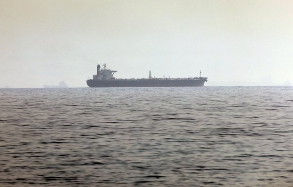 A ship is pictured off the coast of Fujairah in the United Arab Emirates on April 14, 2021. [Giuseppe Cacace/AFP]