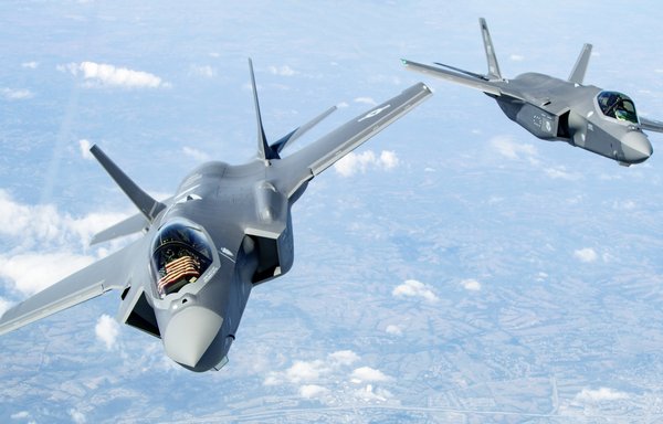 Two F-35s bank after receiving fuel in 2019. [CENTCOM]