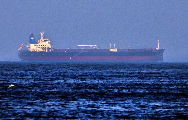 In this file photo taken on August 3, the Israeli-linked Japanese-owned tanker MT Mercer Street can be seen off the port of Fujairah in the United Arab Emirates. On July 30, two crew members of the tanker were killed in a drone attack off Oman blamed on Iran. [AFP]