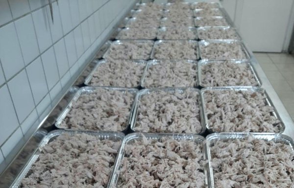 Food trays can be seen in this undated photo as Rim Boueiz's initiative prepares to distribute food rations to needy families. [Rim Boueiz]