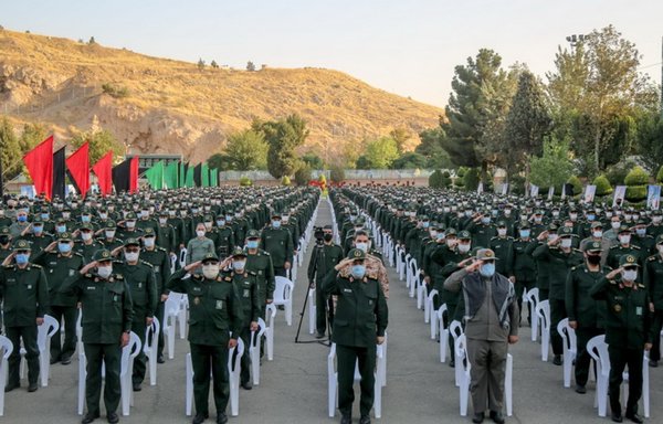 IRGC officers salute in unison during a meeting earlier this year. [IRGC]