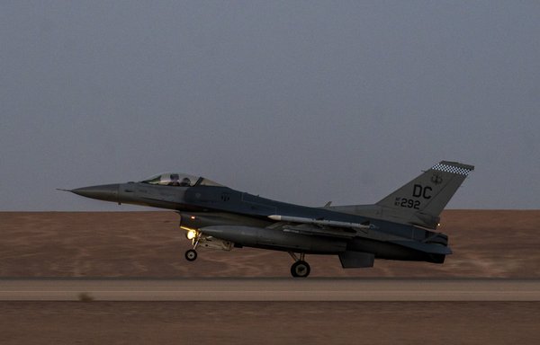 A US Air Force F-16 Fighting Falcon lands on the runway at Prince Sultan Air Base, Saudi Arabia, after participating in a combined counter-unmanned aerial systems training operation with Royal Saudi aircraft, July 29. [US Air Force]