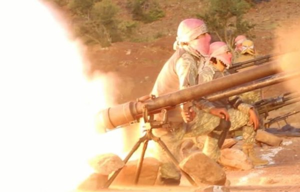 Taliban militants, in a picture posted in 2020, practice firing with weapons made in Russia at an undisclosed location in Afghanistan. [File]