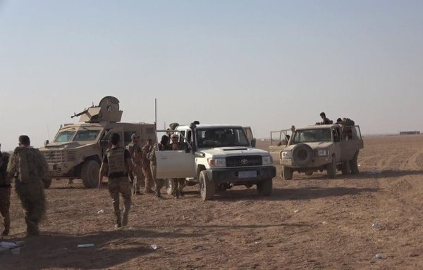 SDF elements conduct a sweep operation near the al-Hasakeh town of Markada in August. [Syrian Democratic Forces]