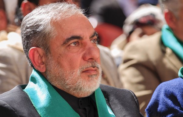 Iranian ambassador to Yemen Hassan Eyrlou attends a vigil in Sanaa on January 2 to mark the first anniversary of the US killing of IRGC Quds Force commander Qassem Soleimani in a drone strike in Baghdad. [Mohammed Huwais/AFP]