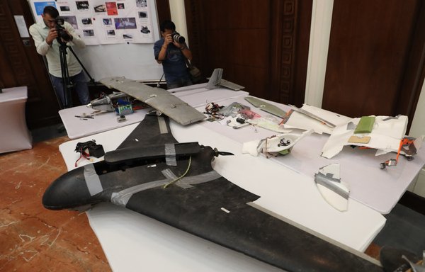A picture taken on June 19, 2018, in Abu Dhabi shows a drone Emirati armed forces say was used by the Iran-backed Houthis in Yemen in battles against Arab coalition forces. [Karim Sahib/AFP]