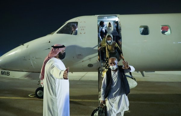 Afghan civilians in September arrive in the UAE after being evacuated for humanitarian reasons. [Emirates News Agency (WAM)]