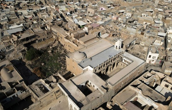 This aerial view shows the Syriac Christian church of Mar Tuma in Mosul on September 18, following the inauguration of its bell seven years after it went silent when ISIS overran the city. [Zaid al-Obeidi/AFP]