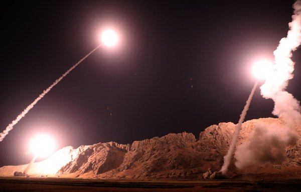 Ballistic missiles being fired from an IRGC-run missile base. [IRGC]