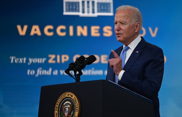 US President Joe Biden delivers remarks on the COVID-19 response and the vaccination programme in Washington August 23. On September 22, the United States pledged to donate an extra 500 million doses of the vaccine to countries struggling to overcome the pandemic. [Jim Watson/AFP]