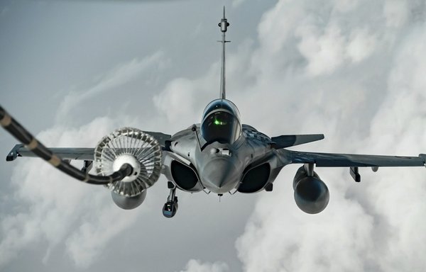 A US Air Force KC-10 aircraft provides fuel to a Qatar Emiri Air Force Rafale aircraft participating in exercise Sky Shield II on March 1. [US Air Force]