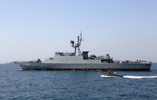 An Iranian warship takes part in 'National Persian Gulf Day' in the Strait of Hormuz on April 30, 2019. [Atta Kenare/AFP]