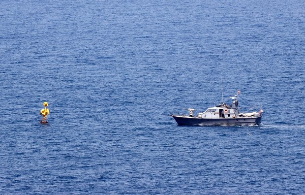 A Lebanese naval vessel patrols near a border-marking buoy in the Mediterranean waters off Lebanon's southern coast on May 4. [Jack Guez/AFP]
