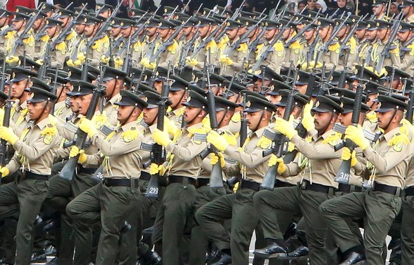 Kuwaiti servicemen perform during a graduation ceremony for army officers at Ali al-Sabah Military Academy in Kuwait City on February 17, 2020. The army on October 13 announced Kuwaiti women will now be allowed to enlist in the military in combat roles. [Yasser al-Zayyat/AFP]
