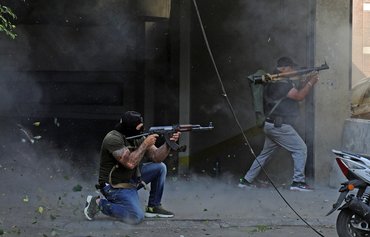 Violence at Beirut rally called by Hizbullah, Amal renews demands for militias to disarm