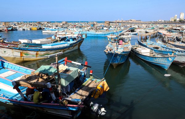 This picture taken January 1, 2019, shows fishing boats moored to a dock in the Yemeni Red Sea port city of al-Hodeidah. Experts say many smuggling operations are carried out using traditional fishing boats. [AFP]