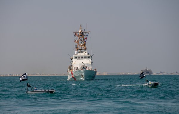 Two MANTAS T-12 unmanned surface vessels operate alongside US Coast Guard patrol boat USCGC Maui during the New Horizon drill in the Arabian Gulf on October 26. [US Naval Forces Central Command]