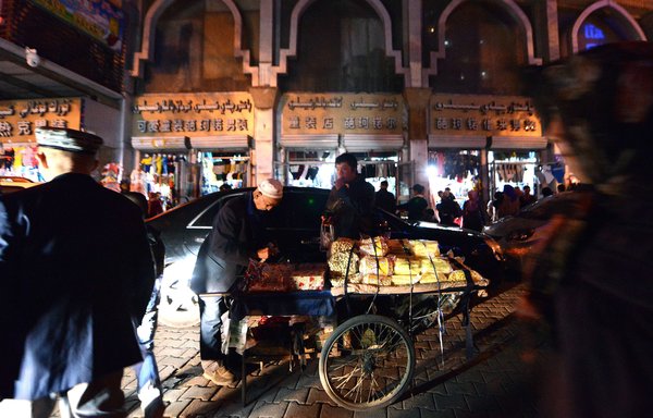 Near the Grand Bazaar in Urumqi, Xinjiang region. [AFP Photo/Goh Chai Hin]